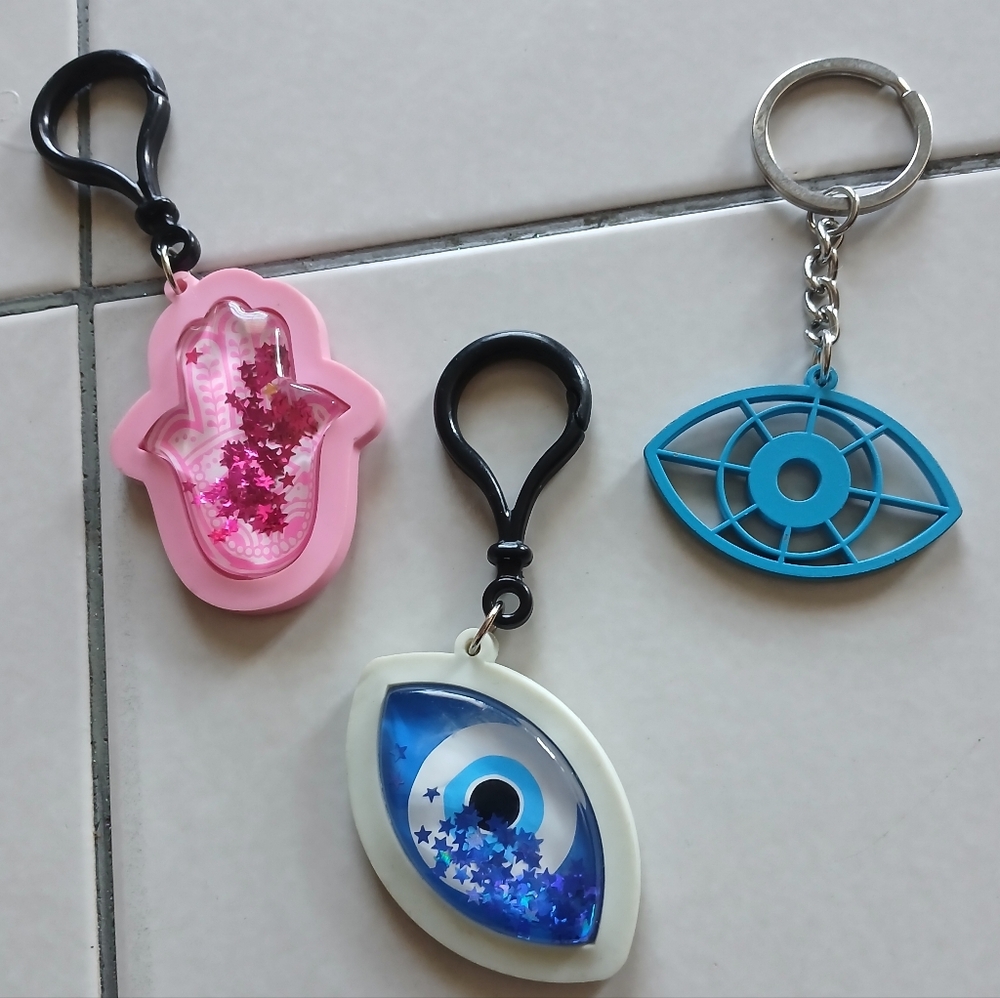 NWOT Evil Eye And Hamsa Hand Keychains